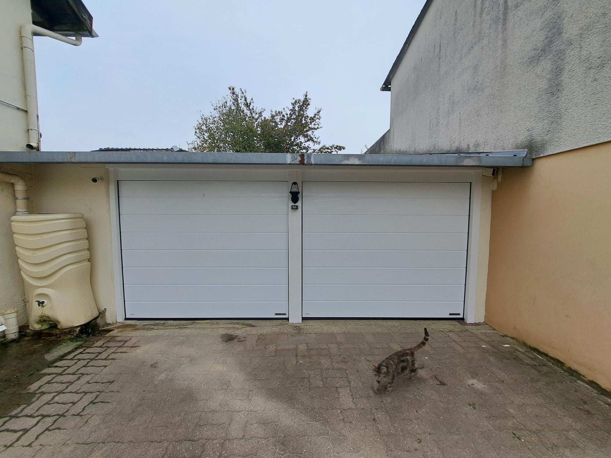 Porte de garage sectionnelle blanche à Rethel Porte de garage sectionnelle blanche à Rethel