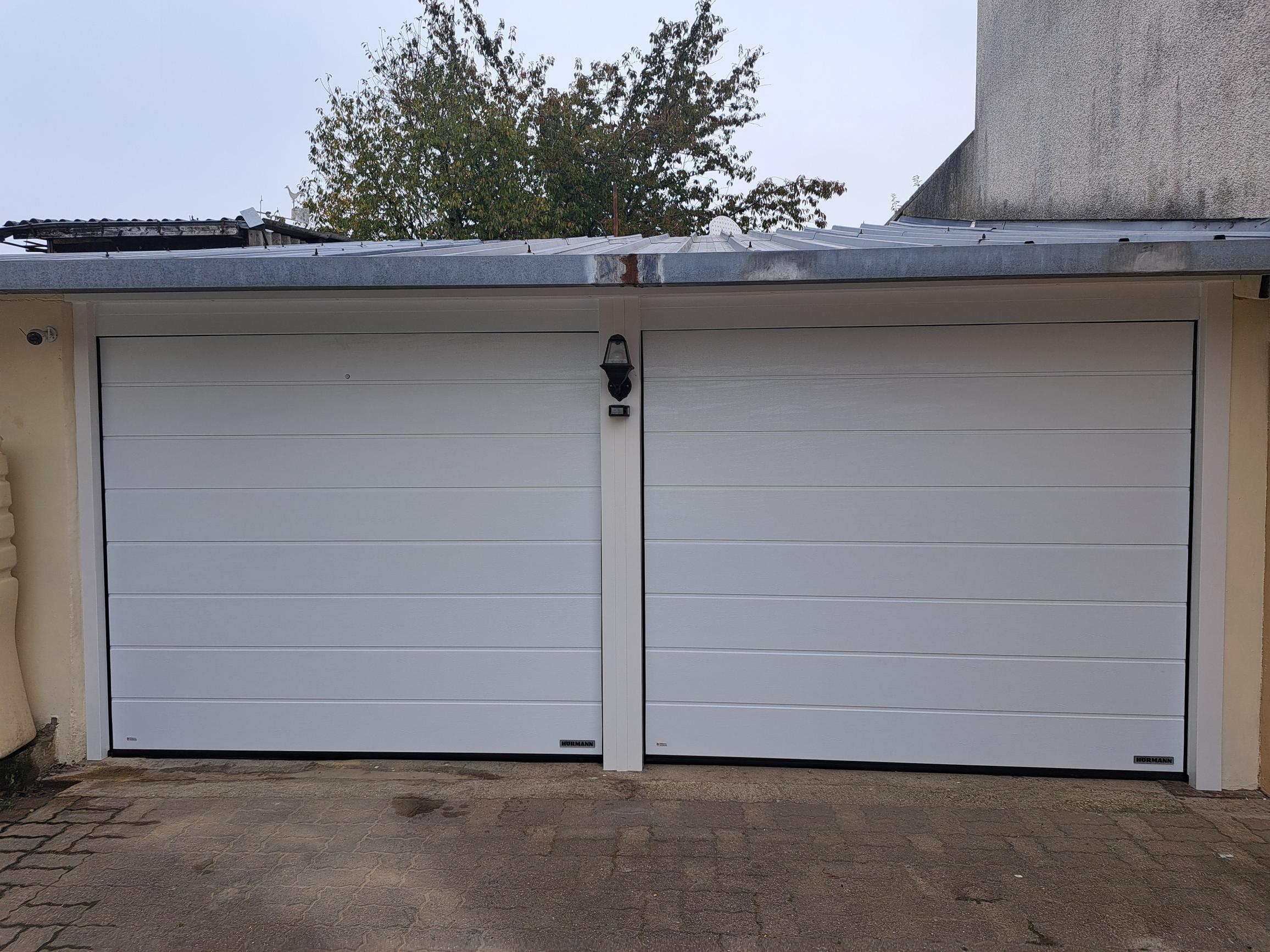 Porte de garage sectionnelle blanche à Rethel Porte de garage sectionnelle blanche à Rethel